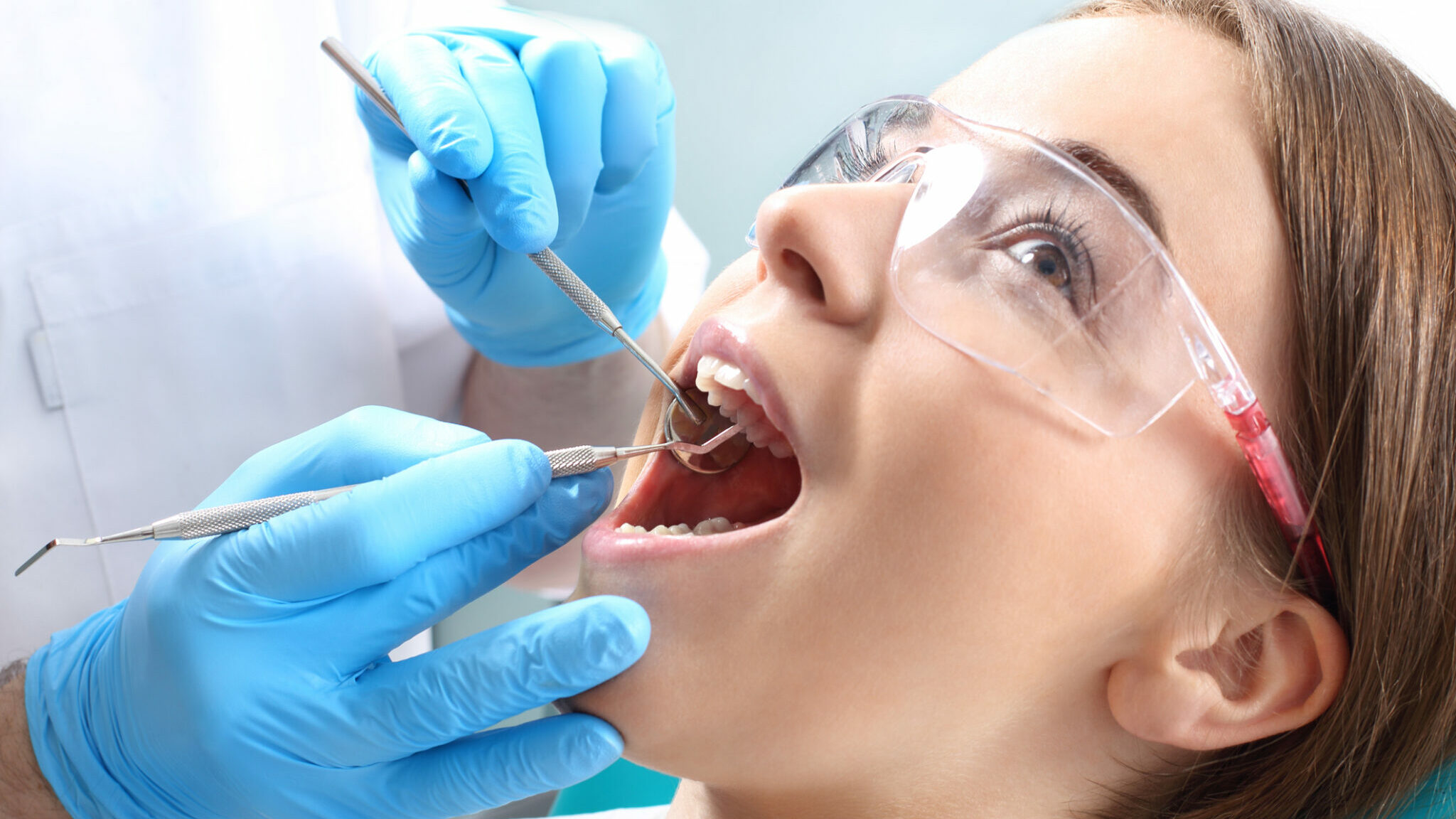 Dentist performing conservative dental treatment